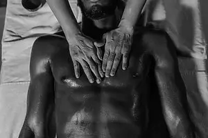 black male receiving a massage