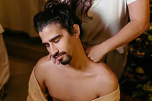 gay massage being performed